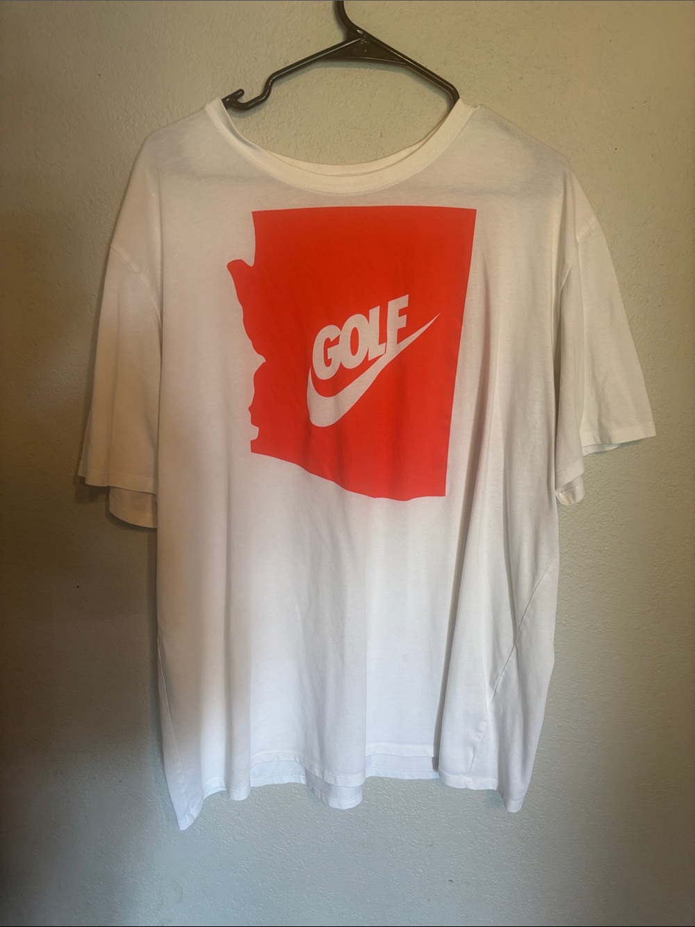 Nike Men’s White Short Sleeve Tee with Red Golf Logo